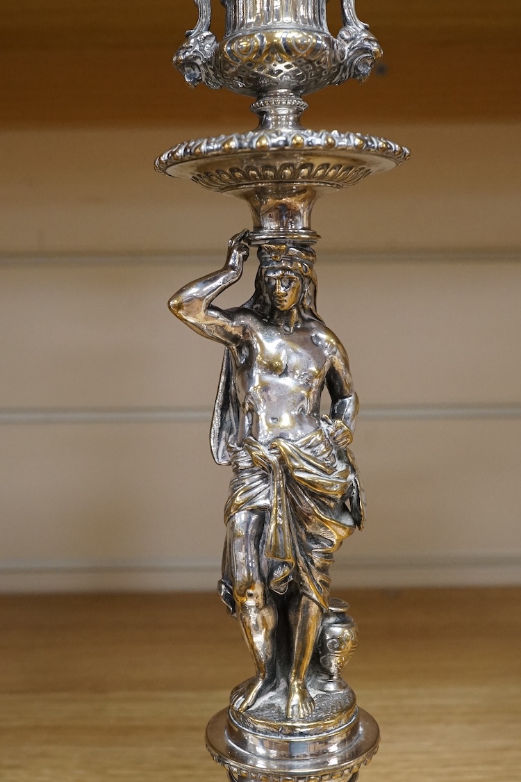 A pair of Elkington electro-plated bronze figural candlesticks c.1860, numbered 369, 29cm high